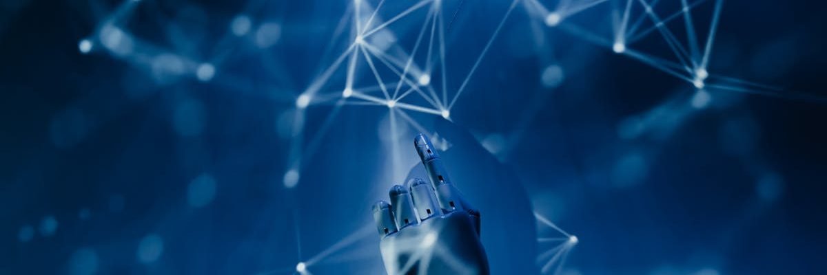 A robotic hand reaching into a digital network on a blue background, symbolizing AI technology.